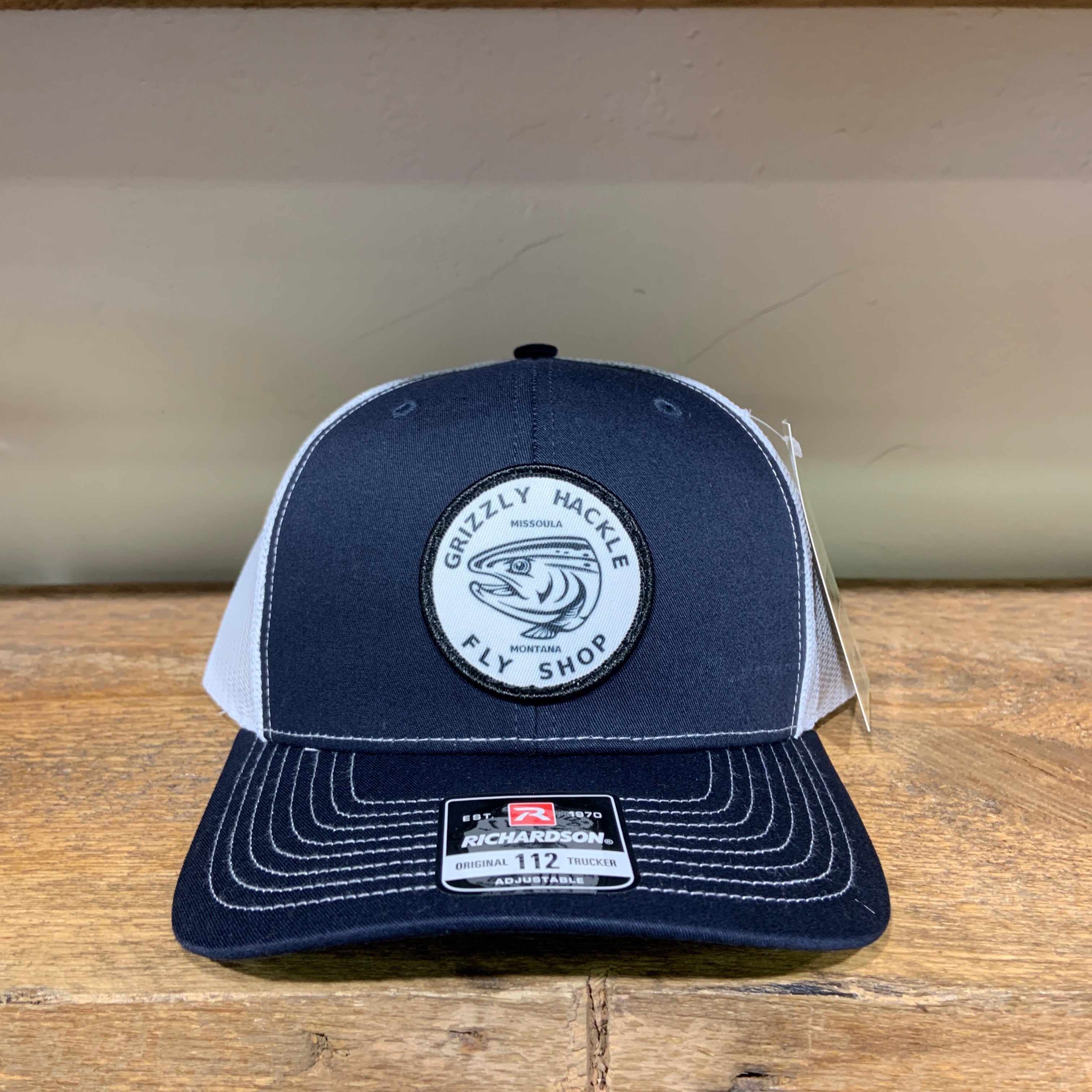 Grizzly Hackle Circle Fish Logo Trucker Hat