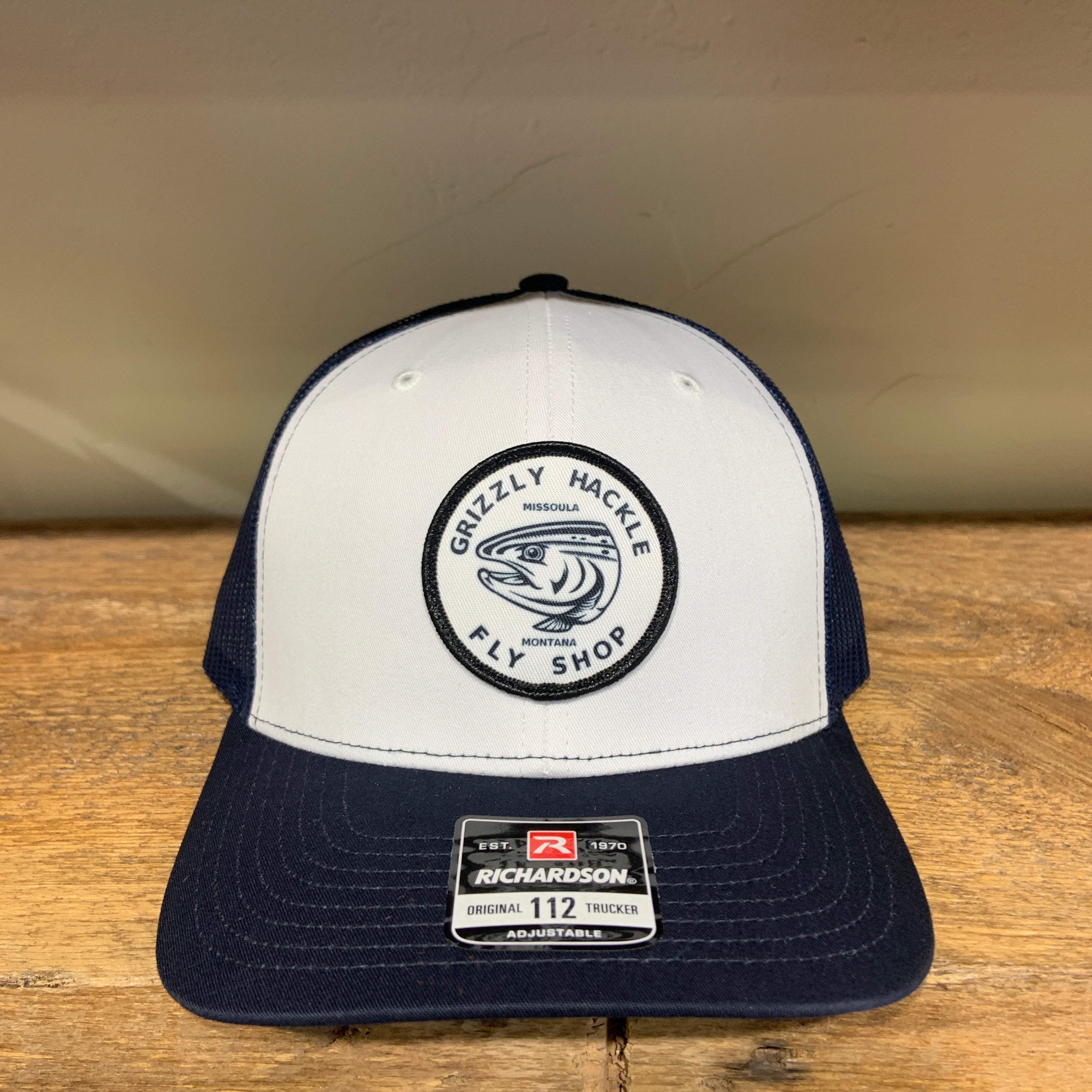 Grizzly Hackle Circle Fish Logo Trucker Hat