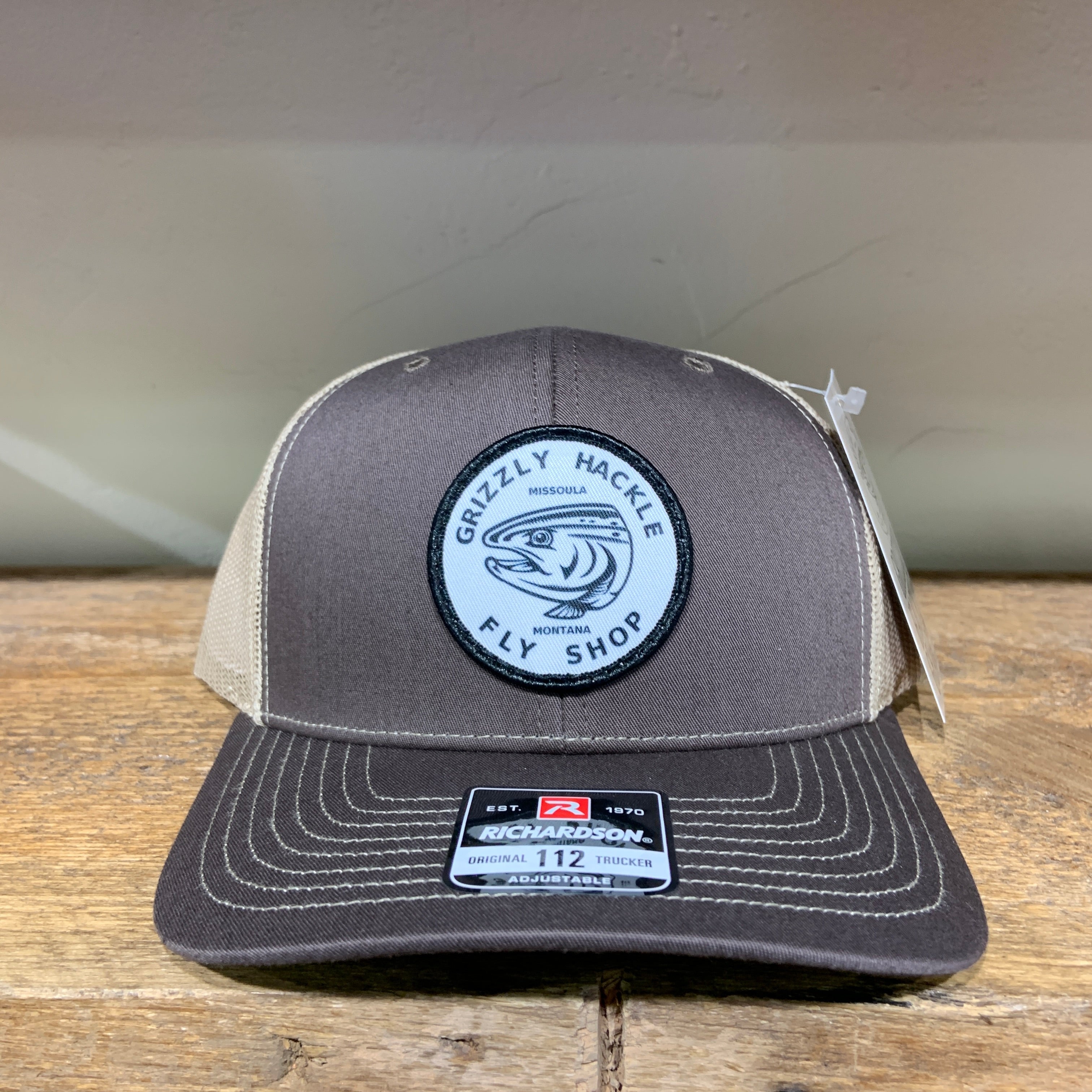 Grizzly Hackle Circle Fish Logo Trucker Hat