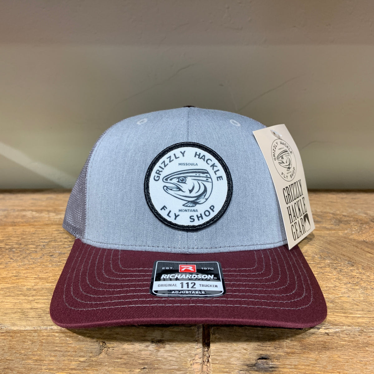 Grizzly Hackle Circle Fish Logo Trucker Hat