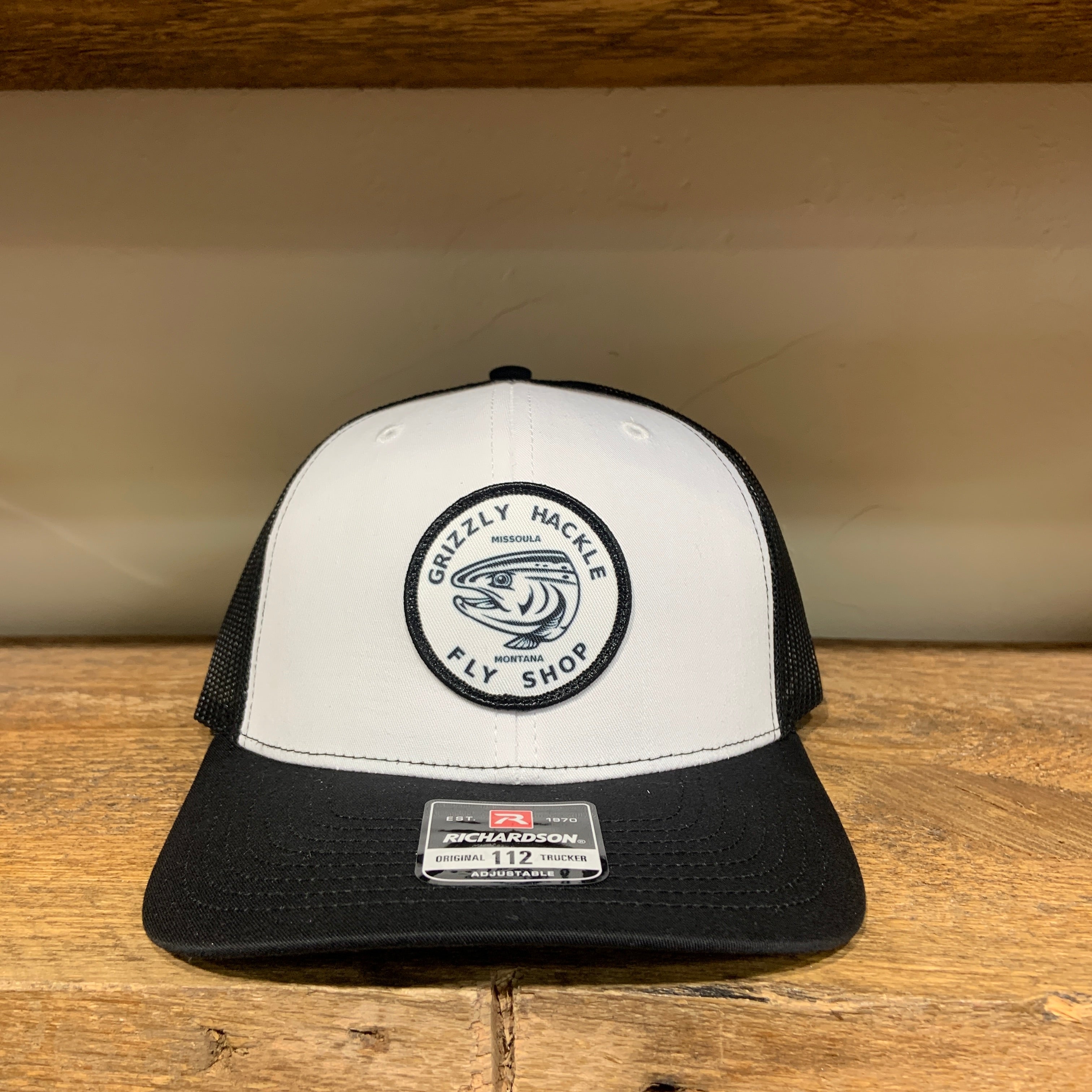 Grizzly Hackle Circle Fish Logo Trucker Hat